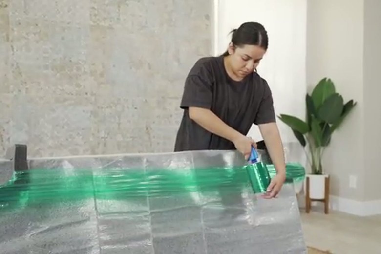 Shrink-wrapping and padding a large piece